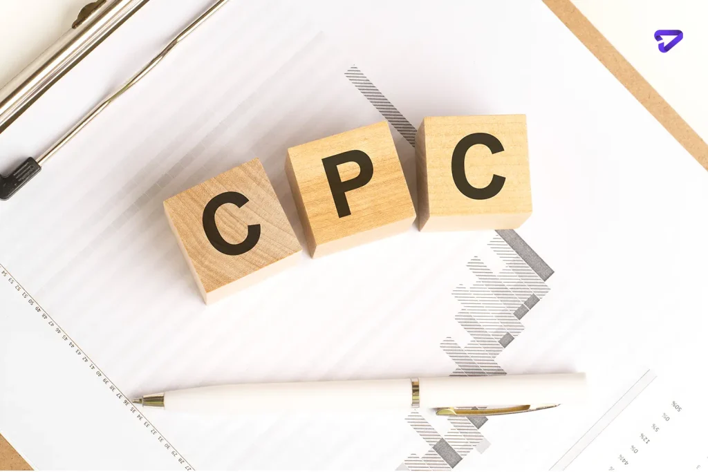wooden blocks with word cpc stand financial background with chart pen business concept copy