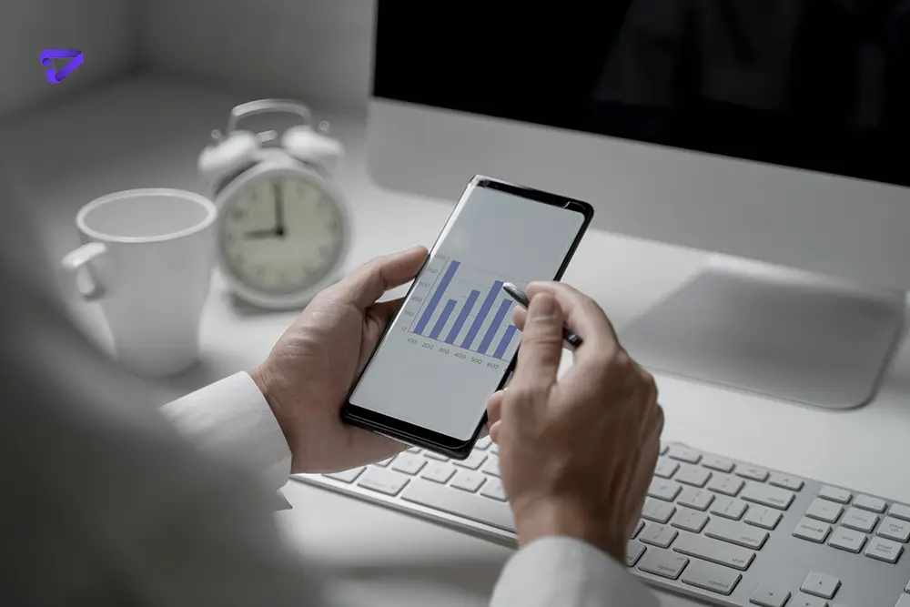 high angle view person using mobile phone computer table copy