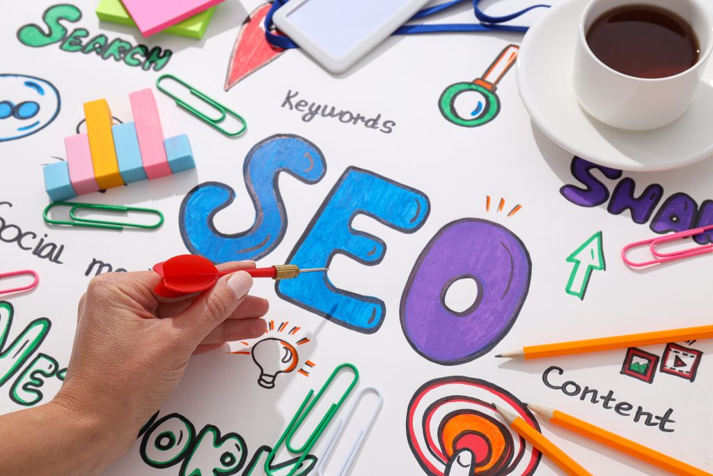Strategic SEO for Local Businesses 1 drawings cup stationery and dart in hand on whit 2025 03 26 21 20 16 utc