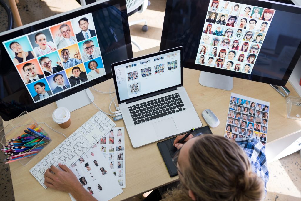 Power of a Professional Web Designer in Charlotte for Small Businesses 1 male executive working over laptop and graphic tab 2025 04 03 16 05 32 utc 1
